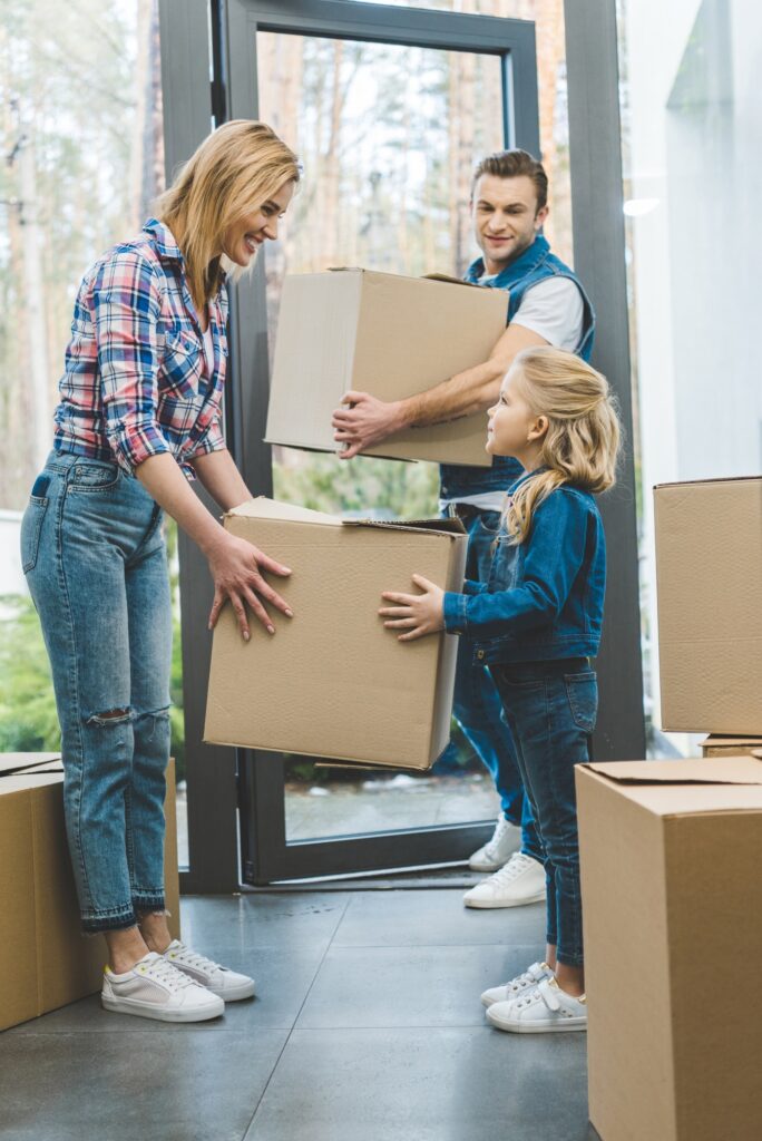 young family moving into new house