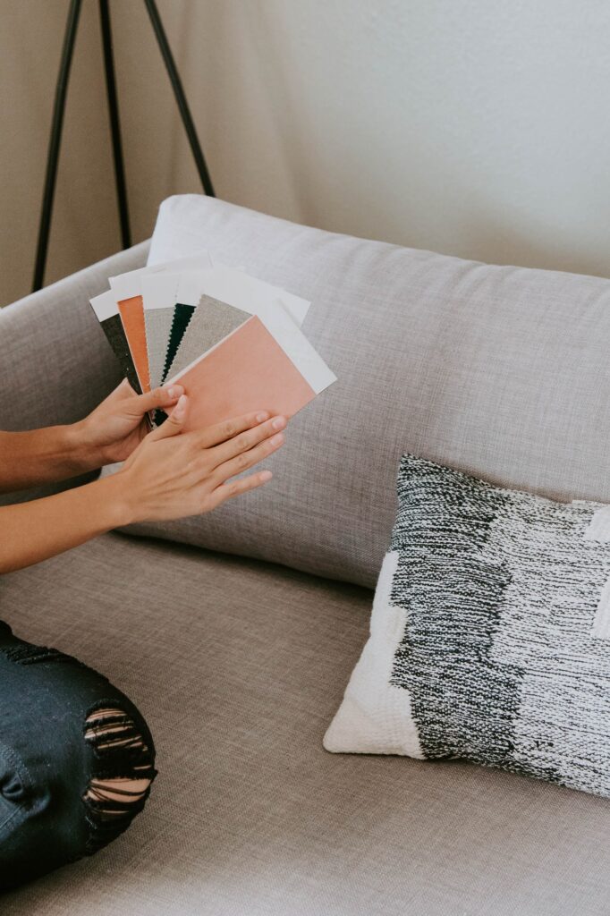 Woman holding fabric swatches